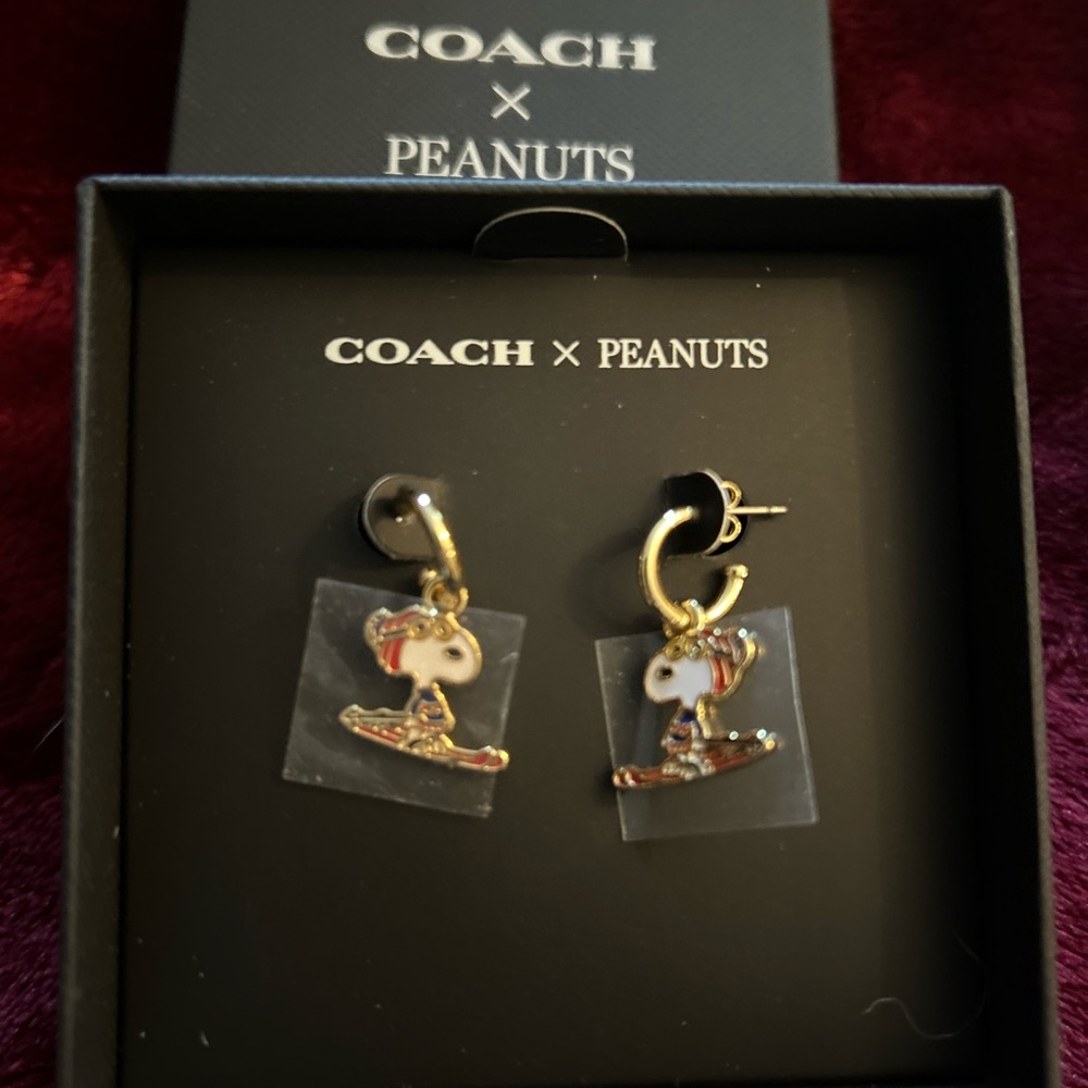 New in Box Coach Limited Snoopy Earrings.